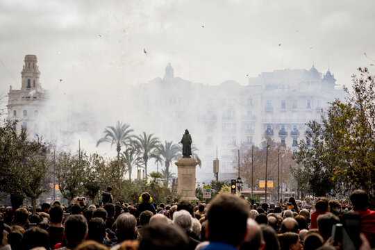 Multitude of Heads Attentively Observing the Explosion of Firecrackers of the Mascleta de Valencia in Fallas from the Town Hall Square