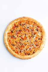 Big pizza with meat and red pepper on a white background.