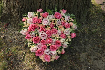 heart shaped sympathy flower arrangement