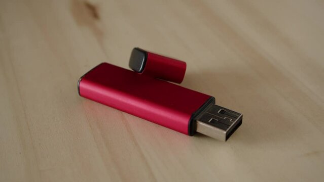 USB Flash Drive moving on a wooden turntable