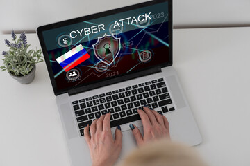 flag of Russia , computer, laptop on table and dark background