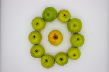 Few green apples on white background