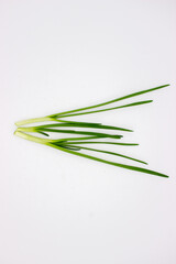 Green onions on white background