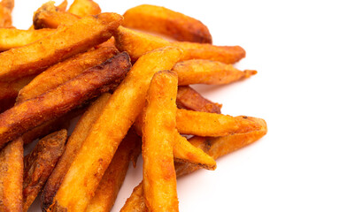Pile of Crispy French Fries Isolated on a White Background