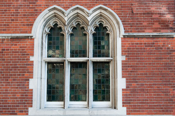 Beautiful window in gothic style. Three arches. London city