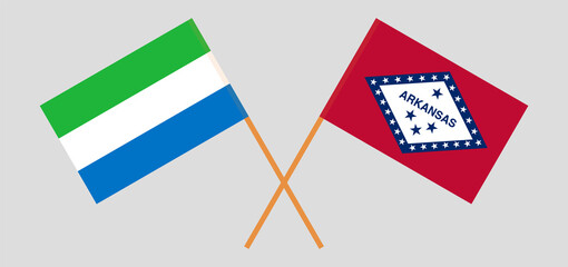 Crossed flags of Sierra Leone and The State of Arkansas. Official colors. Correct proportion