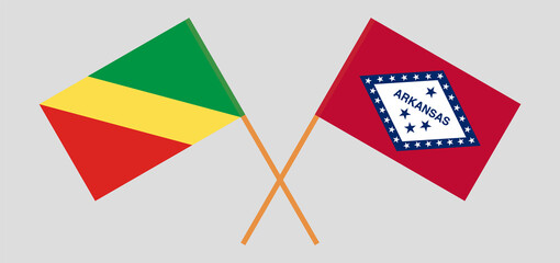 Crossed flags of Republic of the Congo and The State of Arkansas. Official colors. Correct proportion