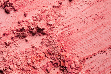 Blusher pink orange or pressed powder textured background