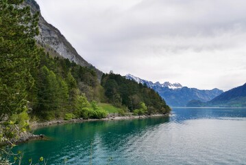 Fototapeta na wymiar Hiking path along lake Walen. St.Gallen, Switzerland.