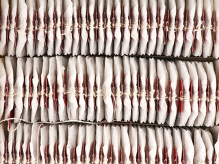 A lot of tea bags in the package. Top view. Closeup