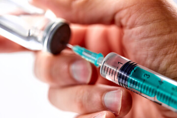  Vaccine in vial with syringe