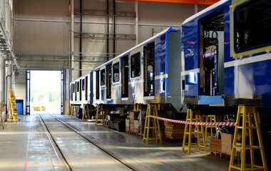 Rail car assembly plant. Industrial workshop for the production of high speed trains. Factory of...