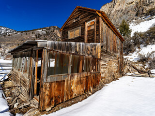 Two story abandon wood cabin in an old Idaho mining town