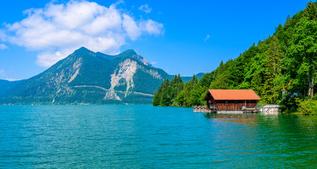 Fototapeta na wymiar Lake Walchensee - close to mountain Herzogstand and Kochel am See - beautiful travel destination in Bavaria, Germany