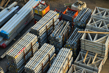 Metal bars, frames and construction equipment on a building site