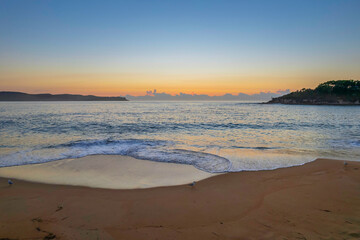 Aerial sunrise seascape with clear skies