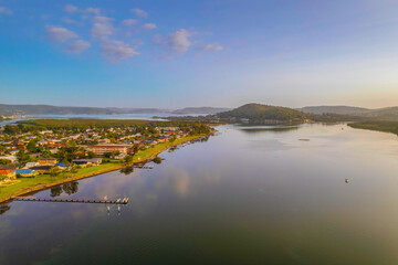 Hazy Sunrise Waterscape with Reflections