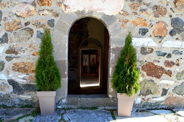 Fototapeta na wymiar the front door of a small stone church