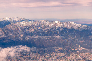 Aerial view of the San Gabriel Mountains outside of Los Angeles featuring Mt Baldy and Mt San Antonio's