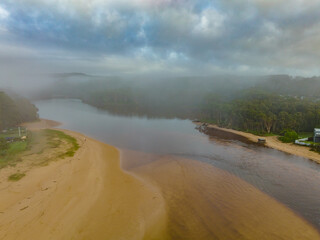Lagoon and seascape with clouds and sea foam