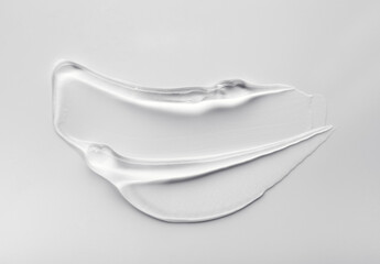 Liquid gel cosmetic smudge drops texture beige grey texture background 