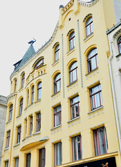 Riga, Latvia - Fragment, detail of Cat House in Old Town of Riga, Latvia; .sculpture of cat on roof