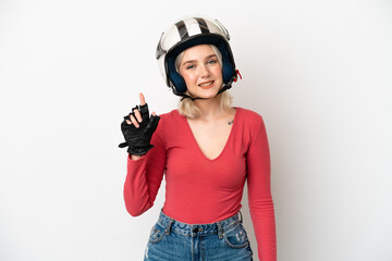Young caucasian woman with a motorcycle helmet isolated on white background showing and lifting a finger in sign of the best