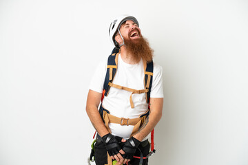 Young rock- climber reddish caucasian man isolated on white background laughing
