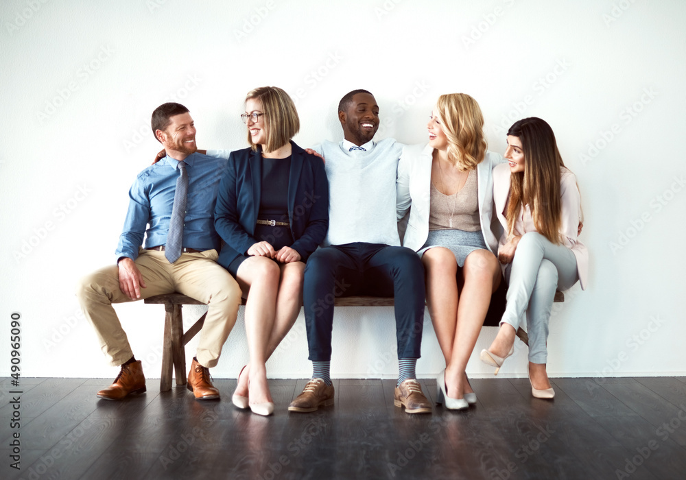Poster so what are you guys doing today. shot of a group of work colleagues seated next to each other again
