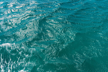 Natural sea blue background sparkling clear water