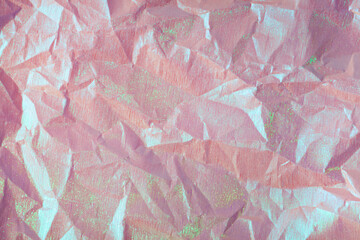 Wrinkled glowing holographic paper abstract background
