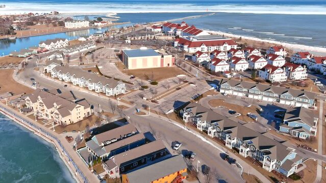 Scenic Sheboygan waterfront area with condos and resorts, aerial view.
