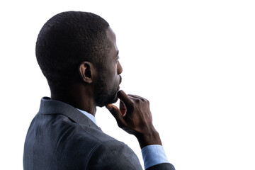 Silhouette of thinking African businessman.