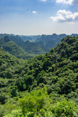 Fototapeta na wymiar Beautiful mountain viewpoint from Cat Ba Island. Vertical. Panorama Of Cat Ba National Park In Vietnam