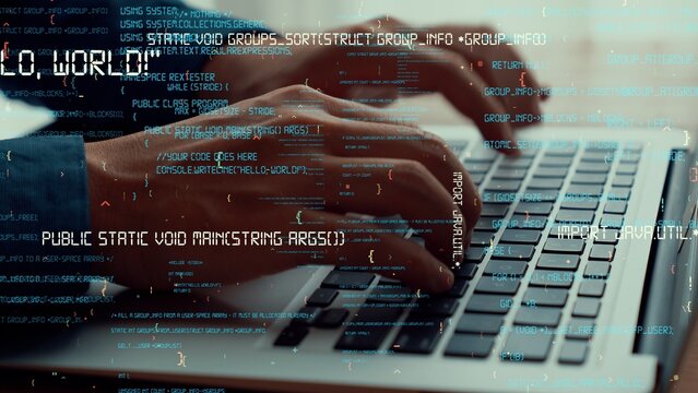 Computer programmer uses capable laptop computer to develop programming code of new software . Computer specialist working on future coding application for software programming development .