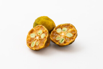 Dried small limes on a white background