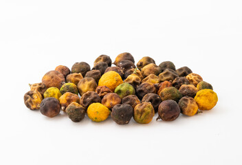 Dried small limes on a white background