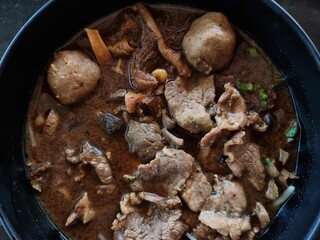 Corned Beef Tenderloin with thickened soups in a cup. focus a point of object.