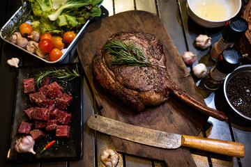 Vegetables and meat on the grill on hot coals with smoke