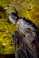 Joseph, Holy Family, sculpture at the Salt cathedral of Zipaquira illuminated in yellow, Colombia
