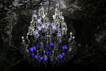 Chandelier with blue lights in famous underground Salt cathedral of Zipaquira in violet light, Colombia