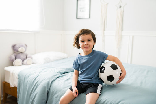 Happy Little Boy Going To A Soccer Match