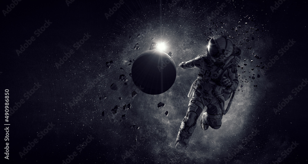 Wall mural astronaut and space exploration theme.
