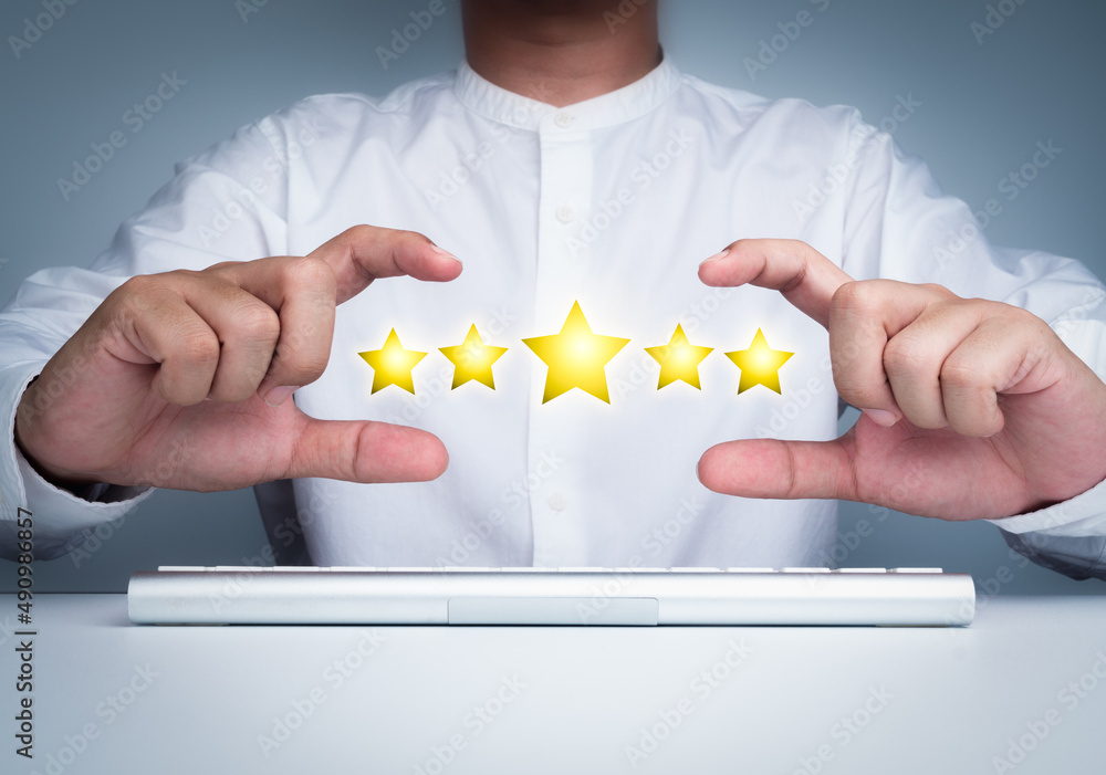 Poster gold five stars point, best excellent rating satisfaction showing by frame making by man's hands whi