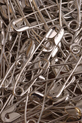 Close up of safety pins, can be a background for text, etc.