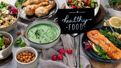 Healthy food assortment on light background.