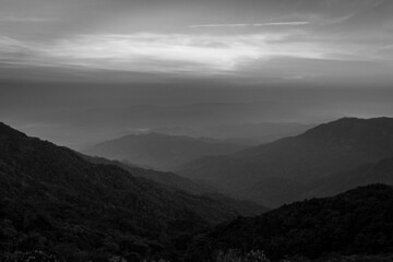 The landscape is a mountain with smog, black and white images,