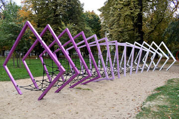 Climbing net in an outdoor playground equipment