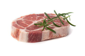 A piece of marbled raw pork or beef steak with a sprig of rosemary and peppercorns on a white background.