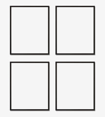 Picture frame mockup. Set of four vertical black frames on white wall. Templates for artwork,...